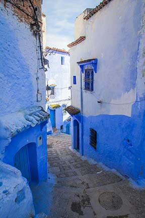 Stairs lead down beguiling alley in chefchaouen